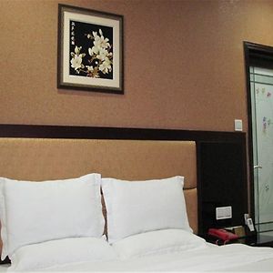 Kamer met een Queen Size Bed